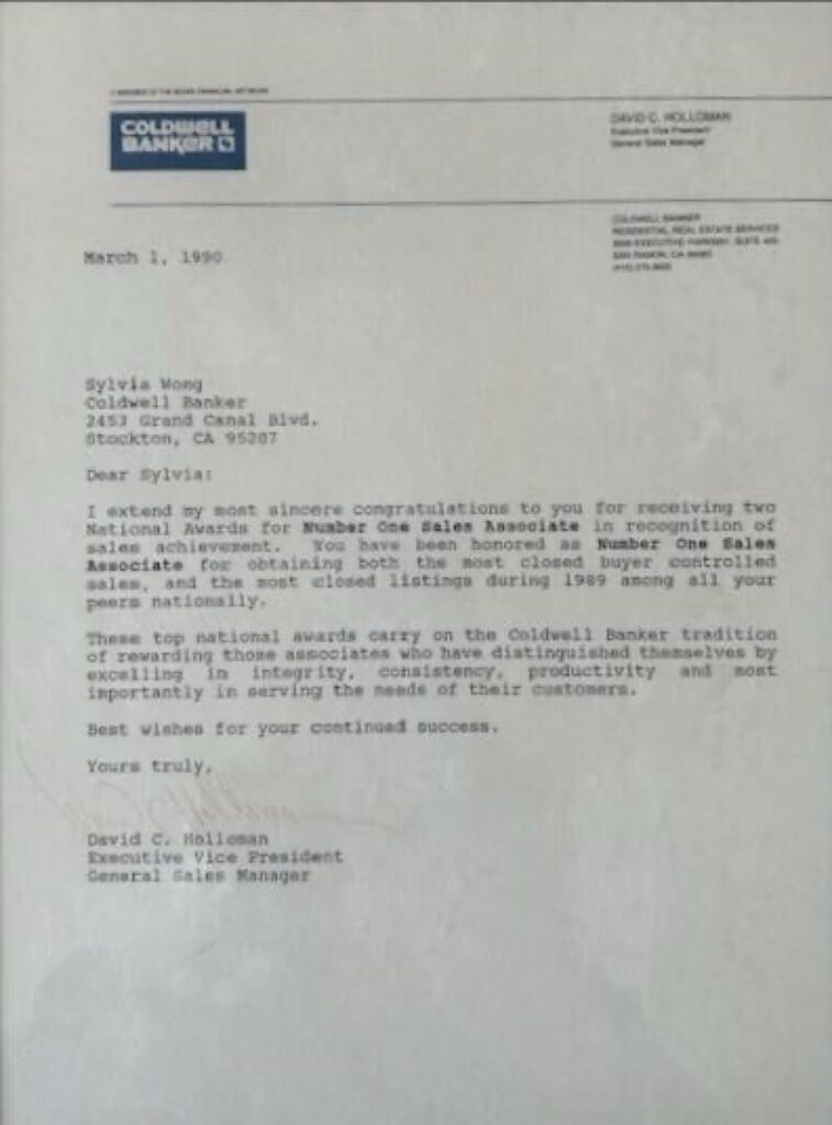 a letter proclaiming Sylvia Wong as the Number One Sales Associate for both closed buyer controlled sales and closed listings in the nation in 1989 for Coldwell Banker